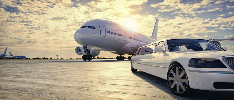 Aircraft on the tarmac beside a waiting vehicle
