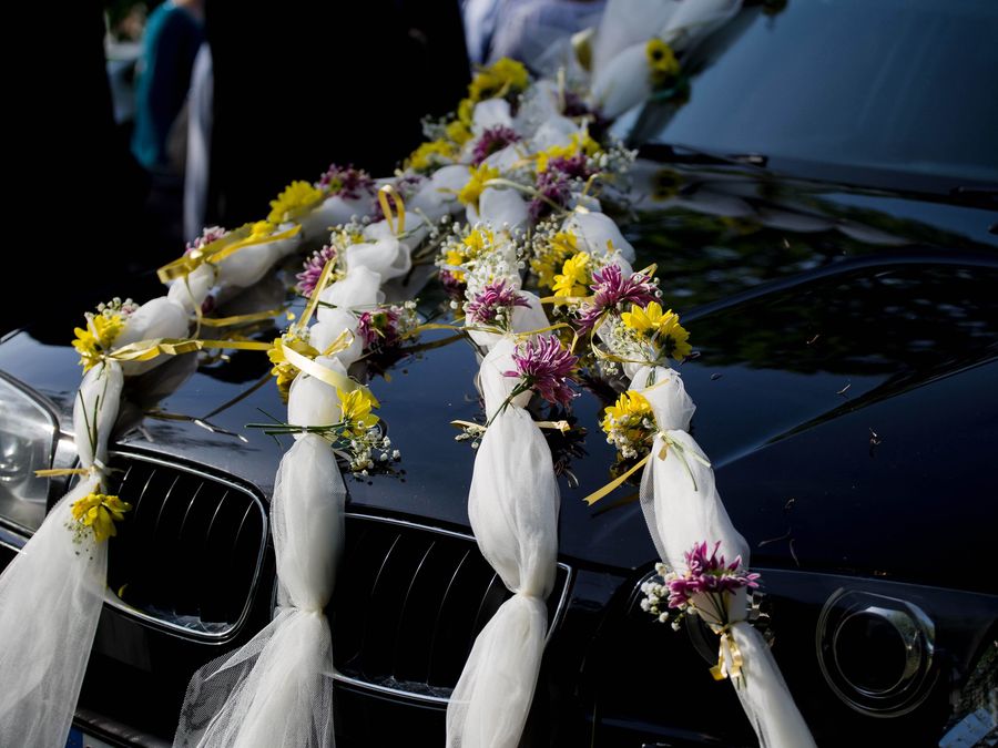 Wedding car decorated with flowers outside a Northern Rivers venue