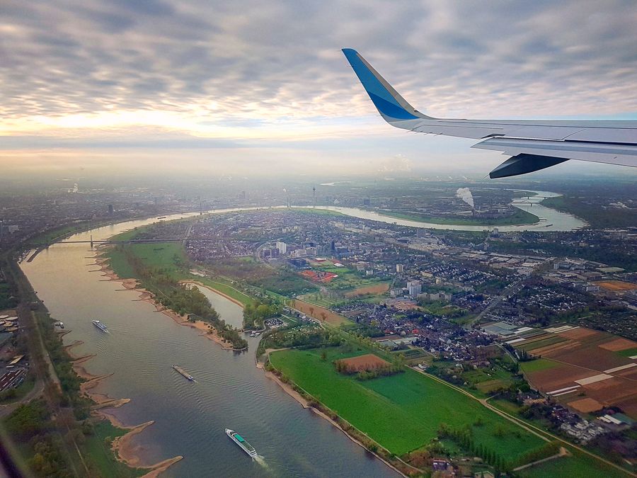 Aircraft wing over the coast — pre-booked airport transfers to Ballina Byron Gateway