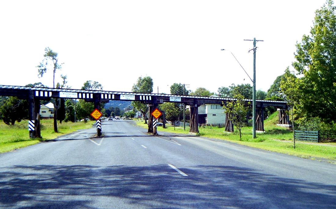 A coastal road winding between headlands — every WhiBlu fare is agreed before the journey starts